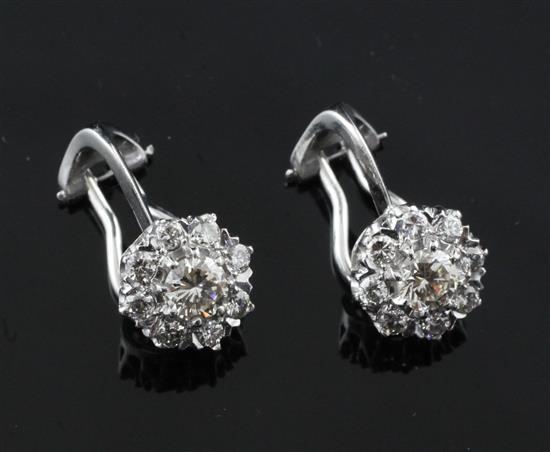 A pair of 18ct white gold and diamond cluster ear clips, diameter 10mm.